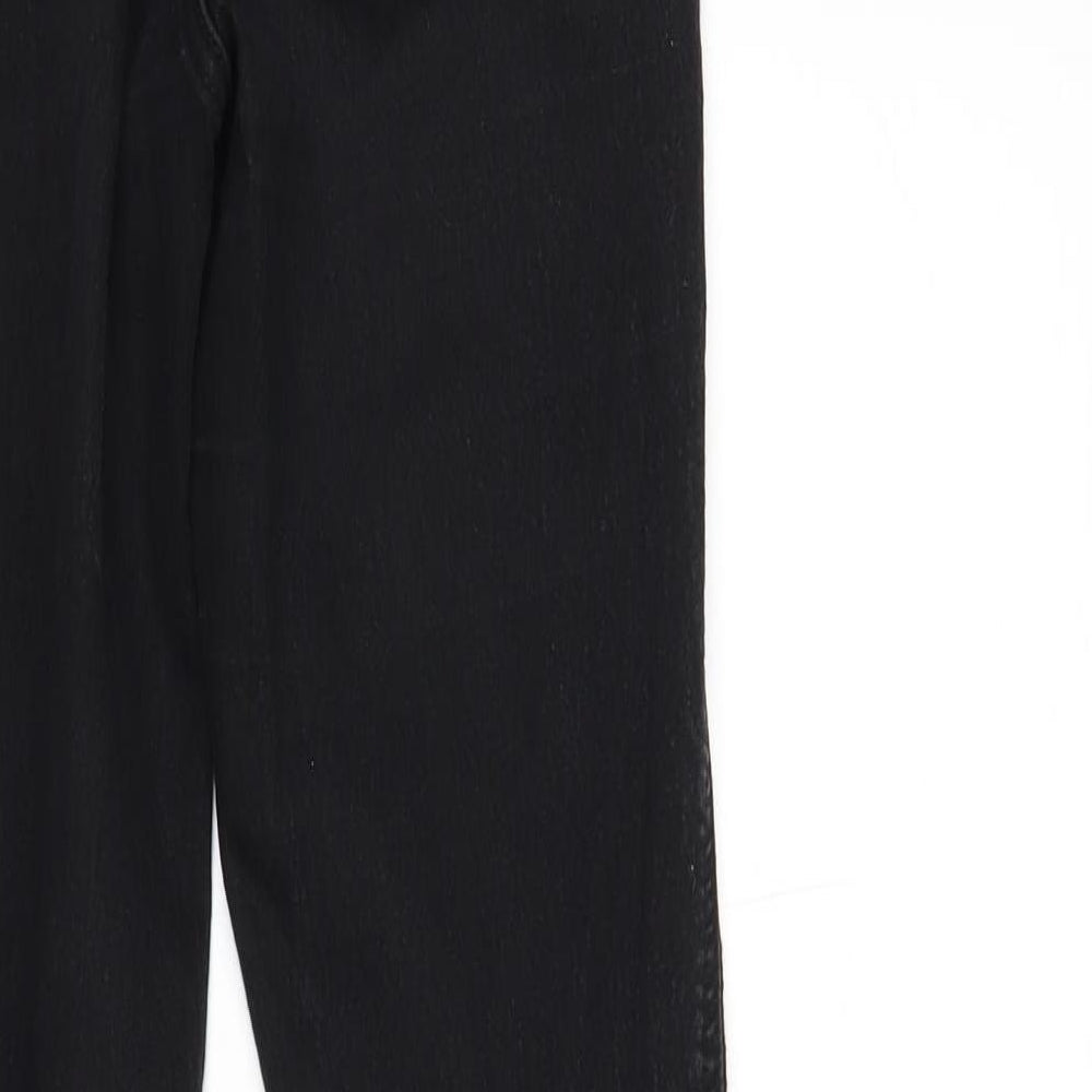 Brand and care label for ASOS women’s black skinny jeans, size UK 26, in, 32-inch leg
