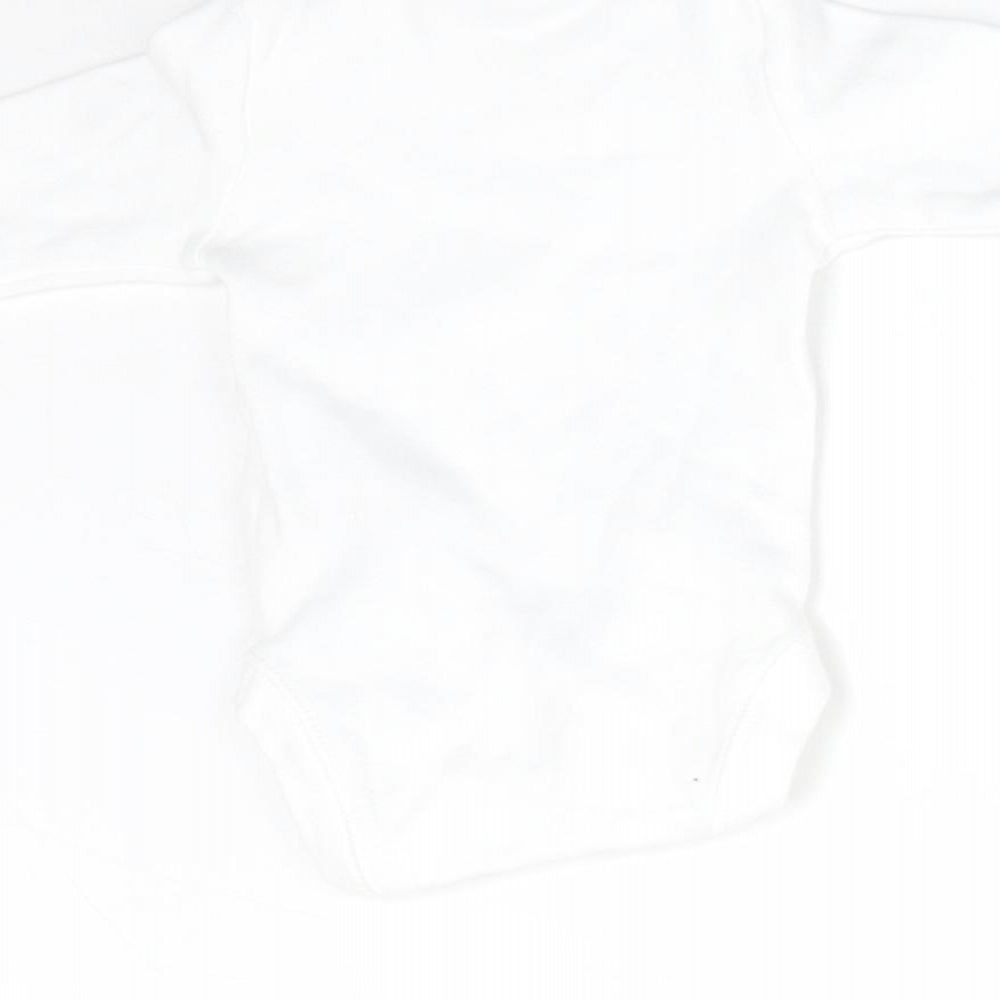 Brand and care label for Primark Baby White Babygrow One-Piece Size Newborn