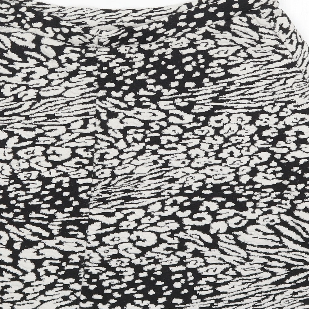 Brand and care label for George women’s multicoloured animal print a-line skirt, size UK 12