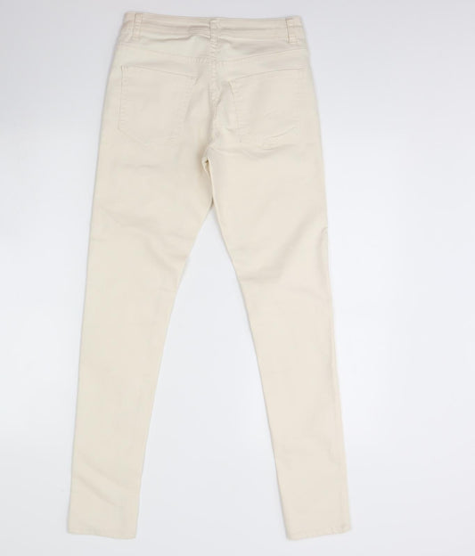 Back view of Forever 21 women’s ivory denim skinny jeans, size UK 26, 29-inch leg