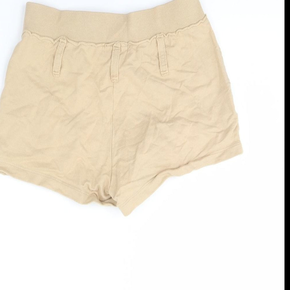 Brand and care label for Mango women’s beige sweat shorts, size S