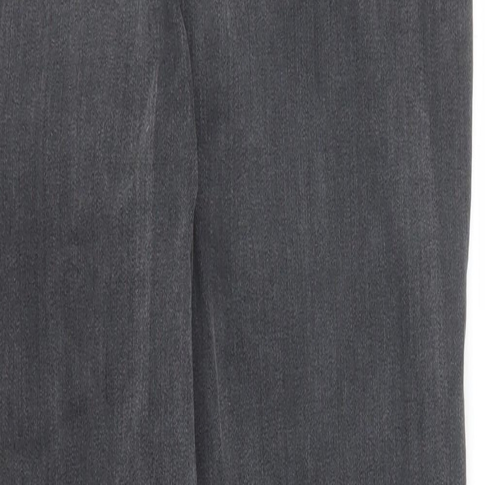 Brand and care label for PRETTYLITTLETHING women’s black denim skinny jeans, size UK 10, 27-inch leg