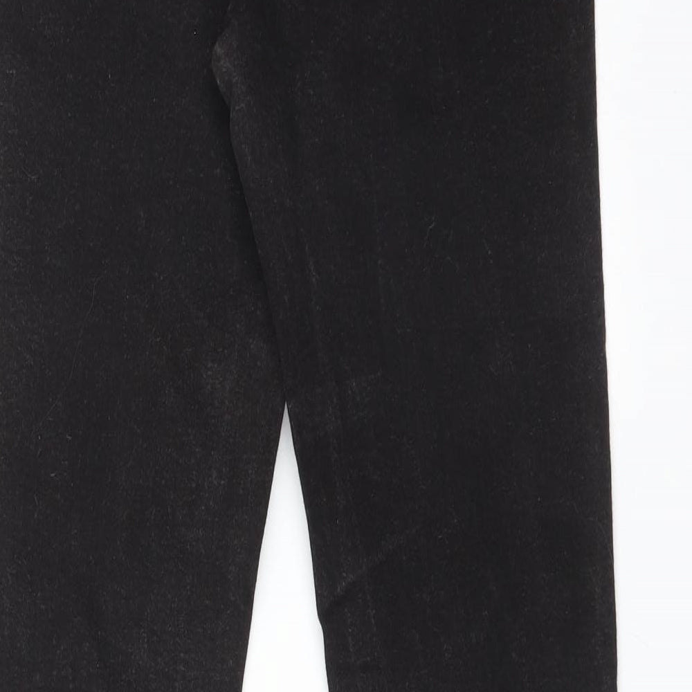 Brand and care label for Topshop women’s black skinny jeans, size UK 28, 32-inch leg