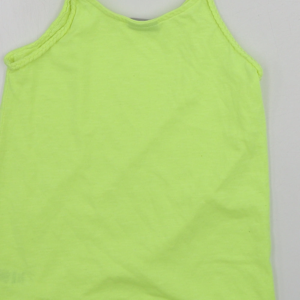 Brand and care label for Matalan girls’ yellow basic tank, size 10, years