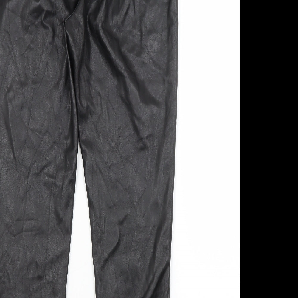 Brand and care label for NA-KD women’s black trousers, size UK 10, 26-inch leg