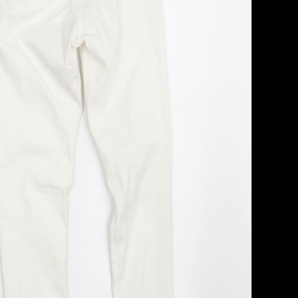 Brand and care label for Topshop women’s ivory denim jegging jeans, size UK 32, in, 32-inch leg