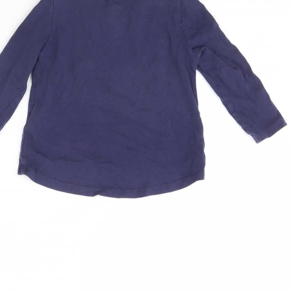 Brand and care label for Lulipu girls’ blue basic t-shirt, size 12, months