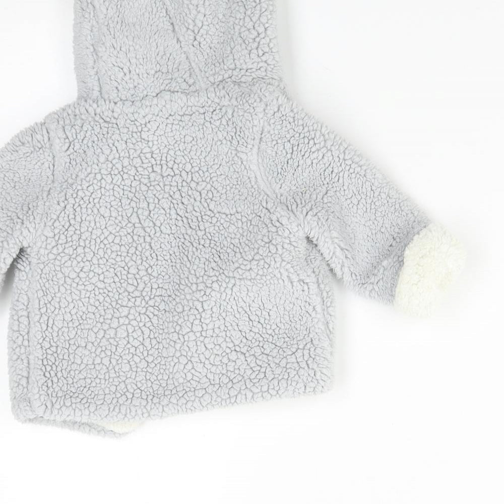 Brand and care label for Matalan Baby Blue Jacket, size 6-9, Months