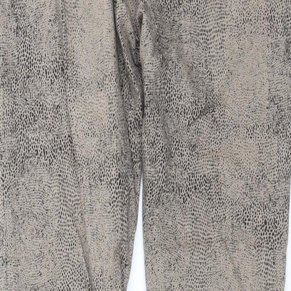Brand and care label for George women’s beige animal print denim skinny jeans, size UK 14, 30-inch leg