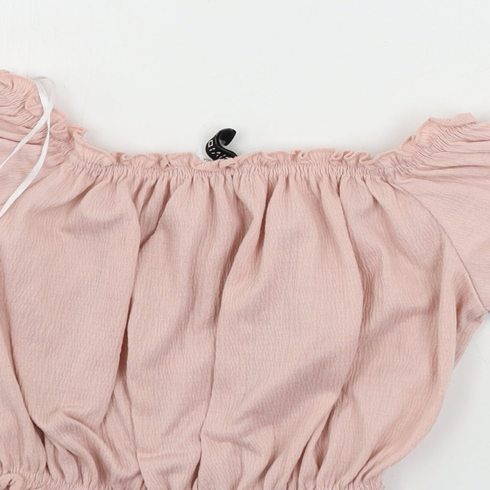 Brand and care label for H&M women’s pink cropped t-shirt, size XS