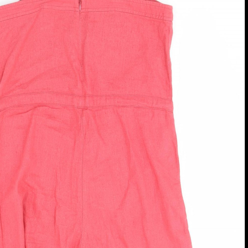 Brand and care label for Gap women’s pink playsuit one-piece, size UK 4, 3-inch leg