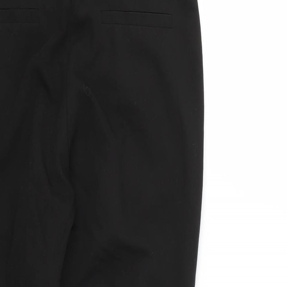 Brand and care label for Topshop women’s black trousers, size UK 10, 23-inch leg