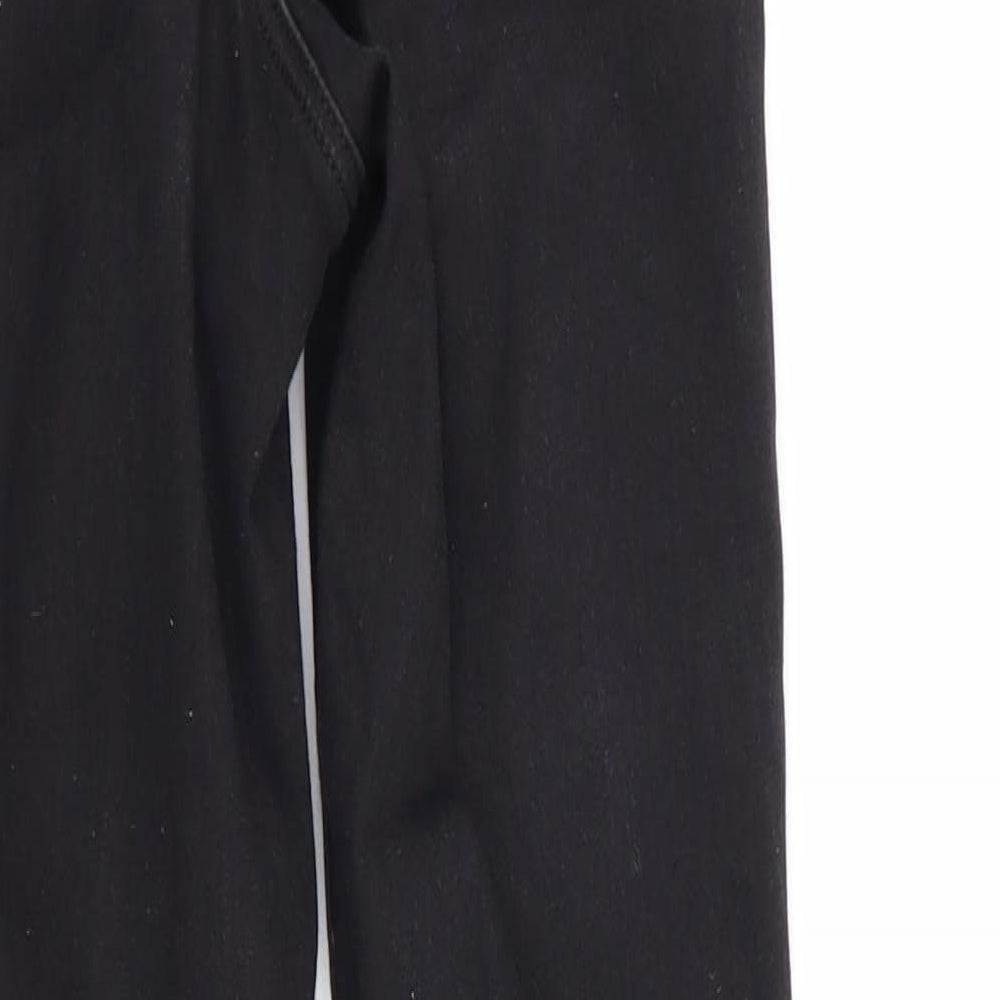 Brand and care label for Topshop women’s black skinny jeans, size UK 25, in, 32-inch leg - ripped jeans