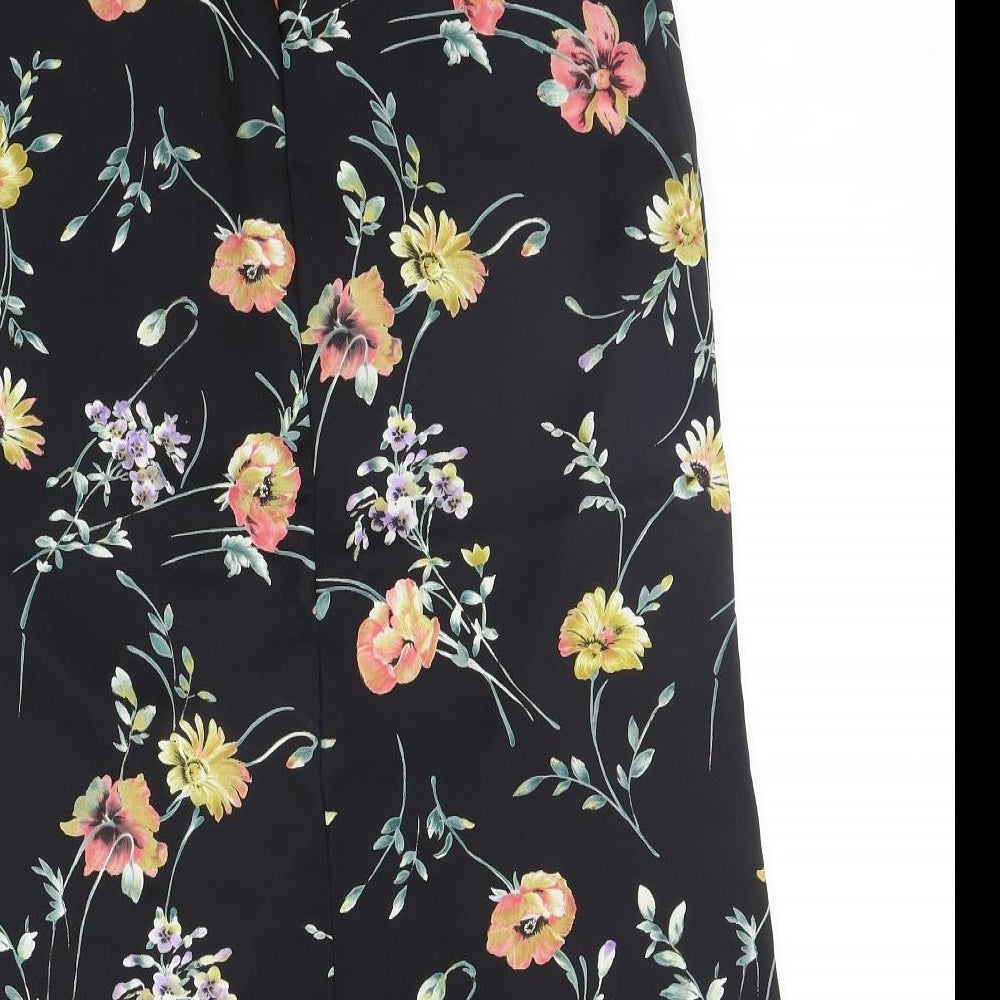 Brand and care label for Leslie Fay women’s blue floral a-line skirt, size UK 8