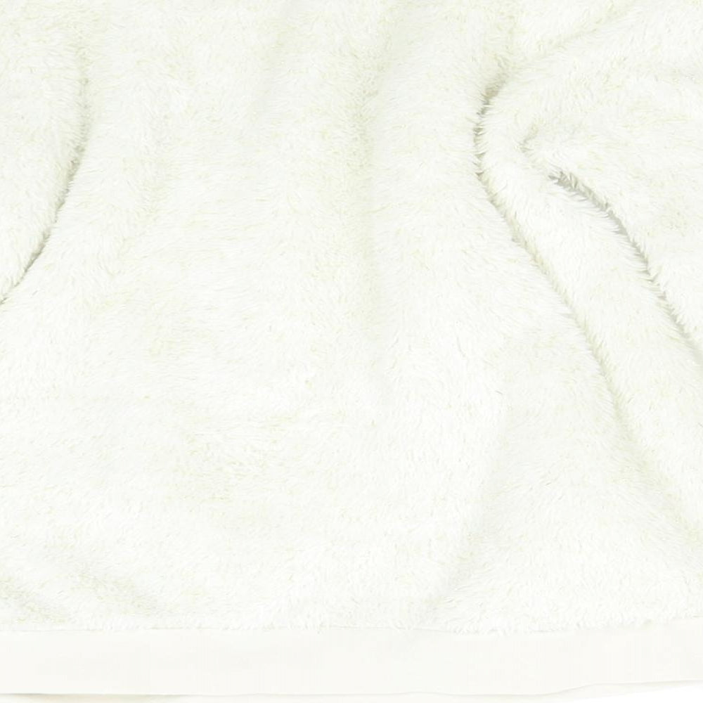 Brand and care label for George girls’ white solid fleece pyjama top, size 8-9, years