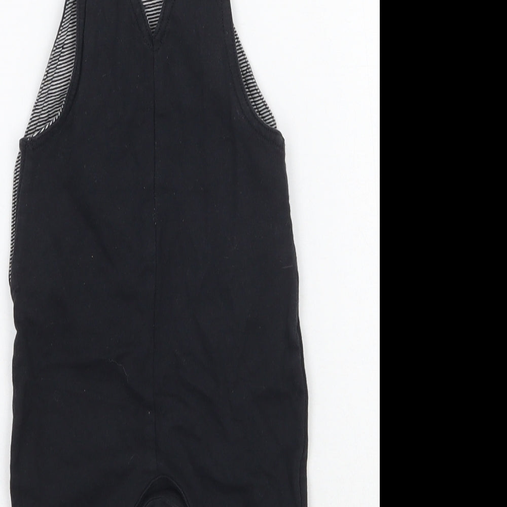 Brand and care label for George boys’ black dungaree one-piece, size 0-3, months