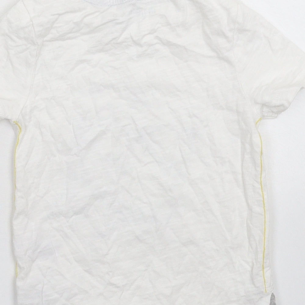 Brand and care label for Nutmeg Baby White Basic T-Shirt, size 12-18, Months