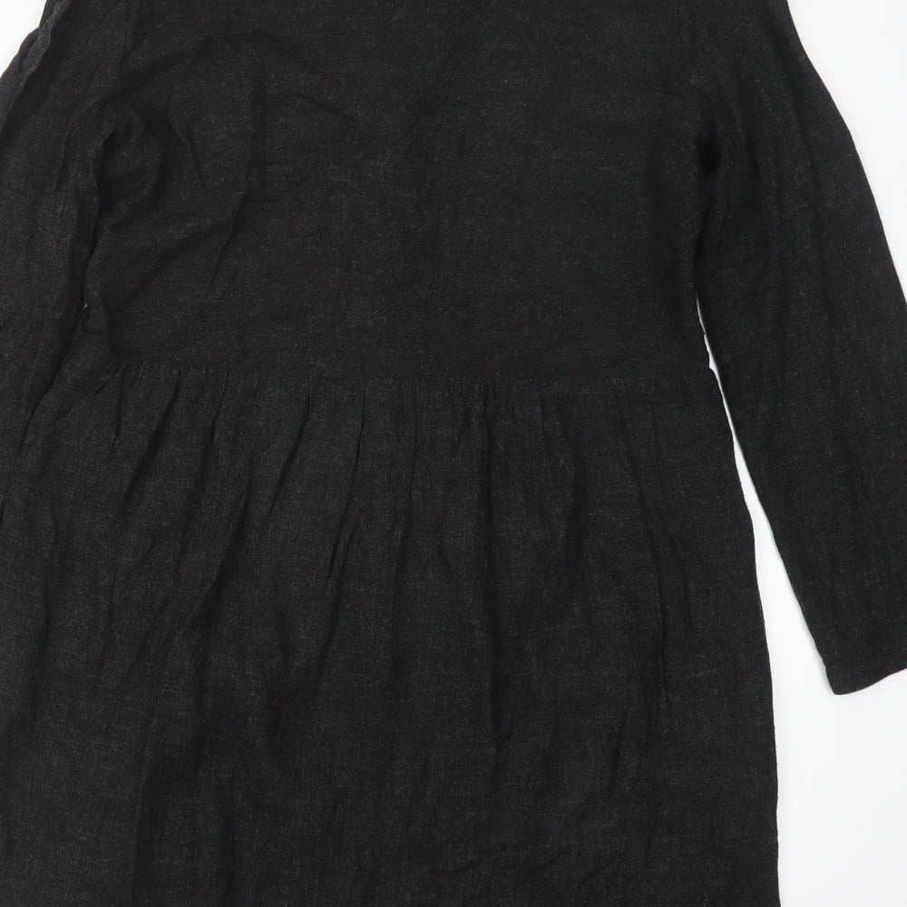 Brand and care label for Zara women’s black t-shirt dress, size S