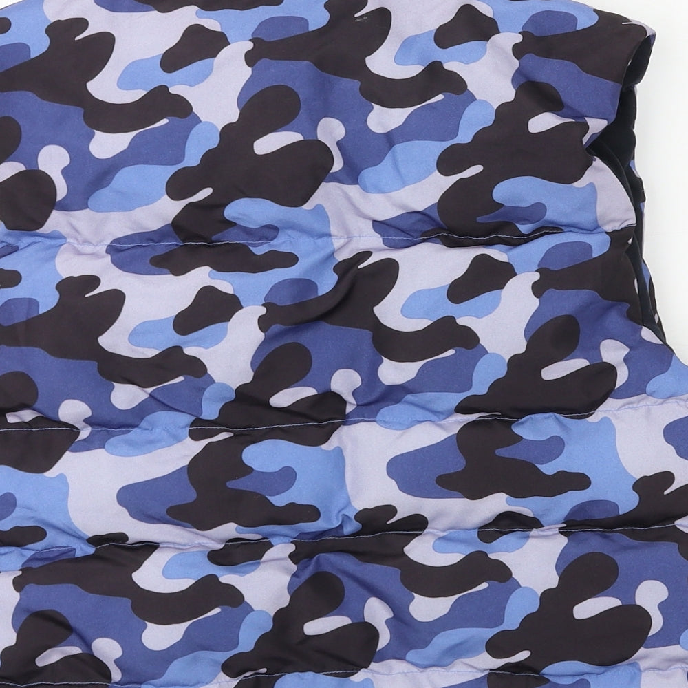 Brand and care label for WTX boys’ blue camouflage gilet jacket, size S