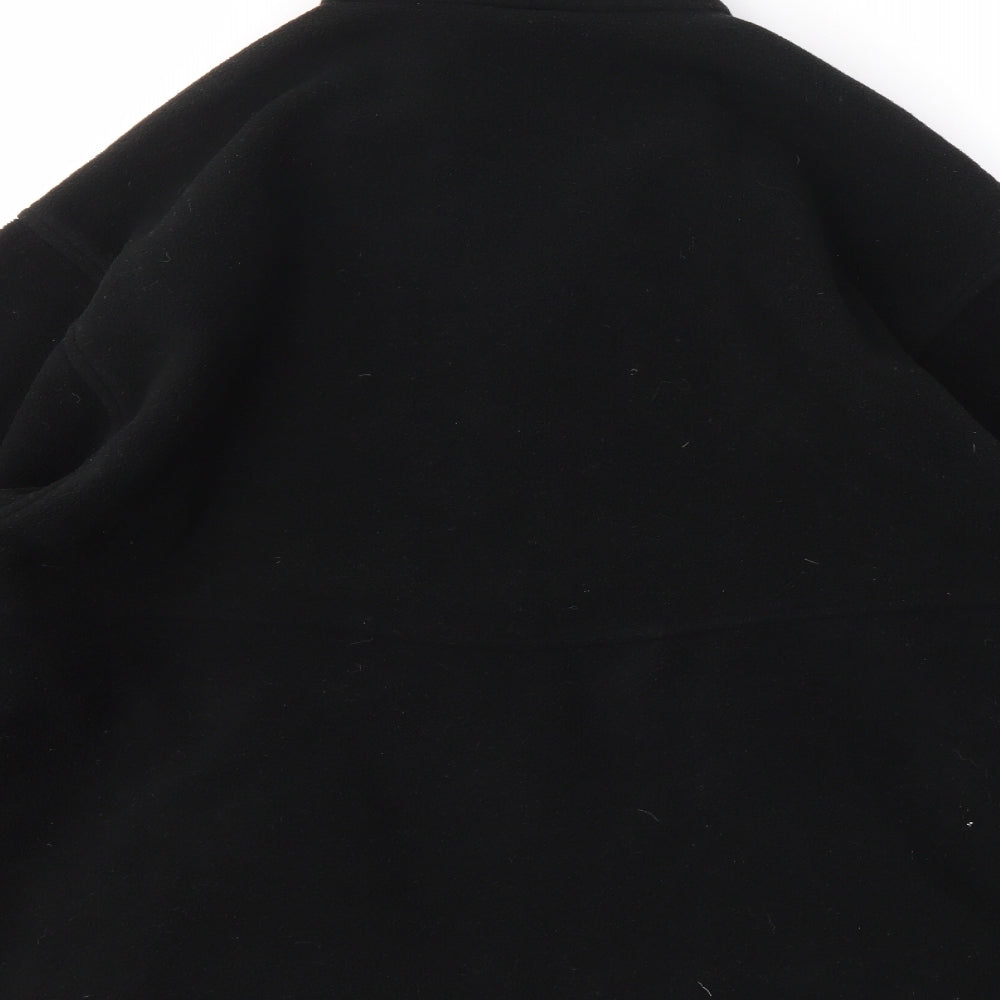 Brand and care label for ULTIMATE CLOTHING women’s black jumper, size XS