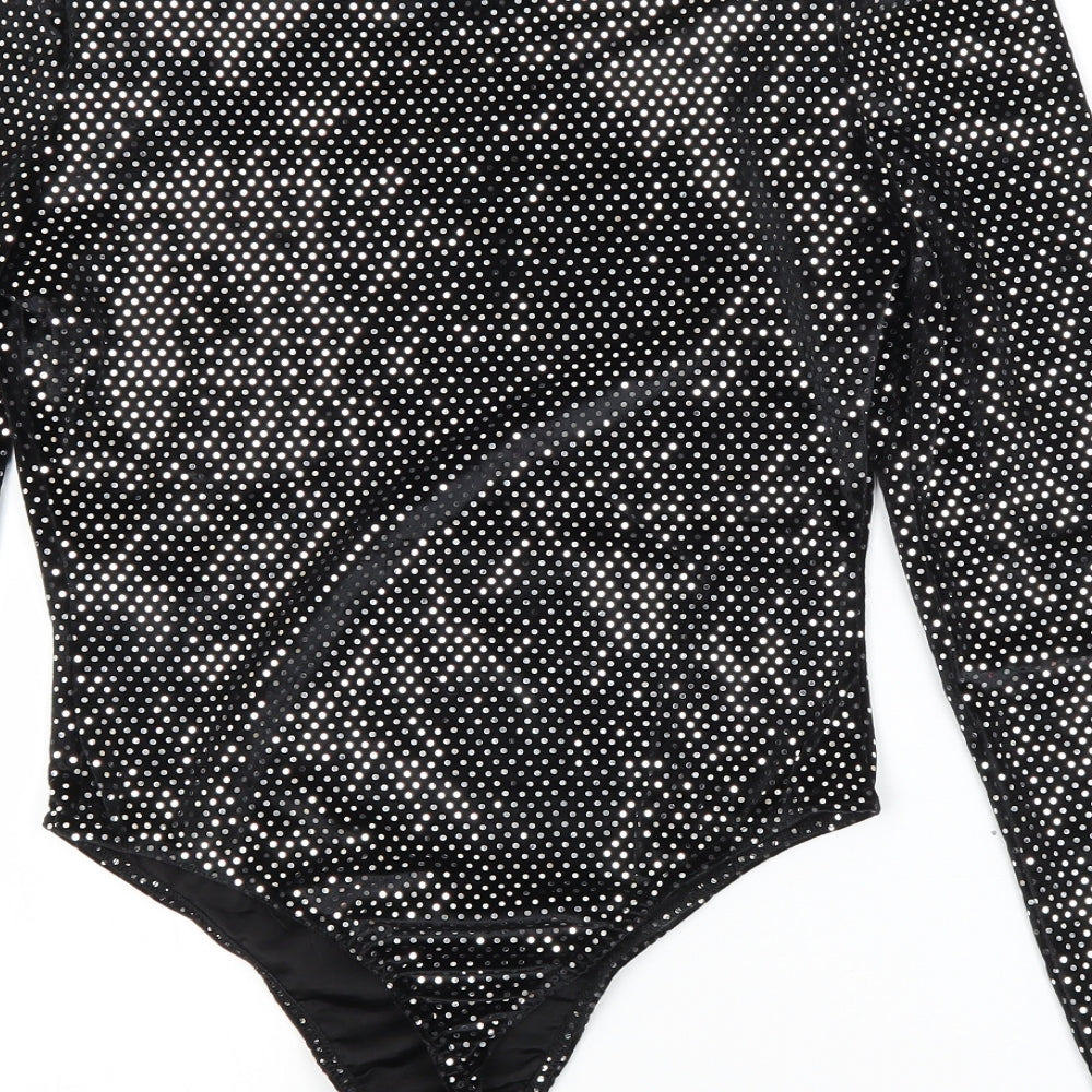 Brand and care label for River Island women’s black unitard one-piece, size UK 10