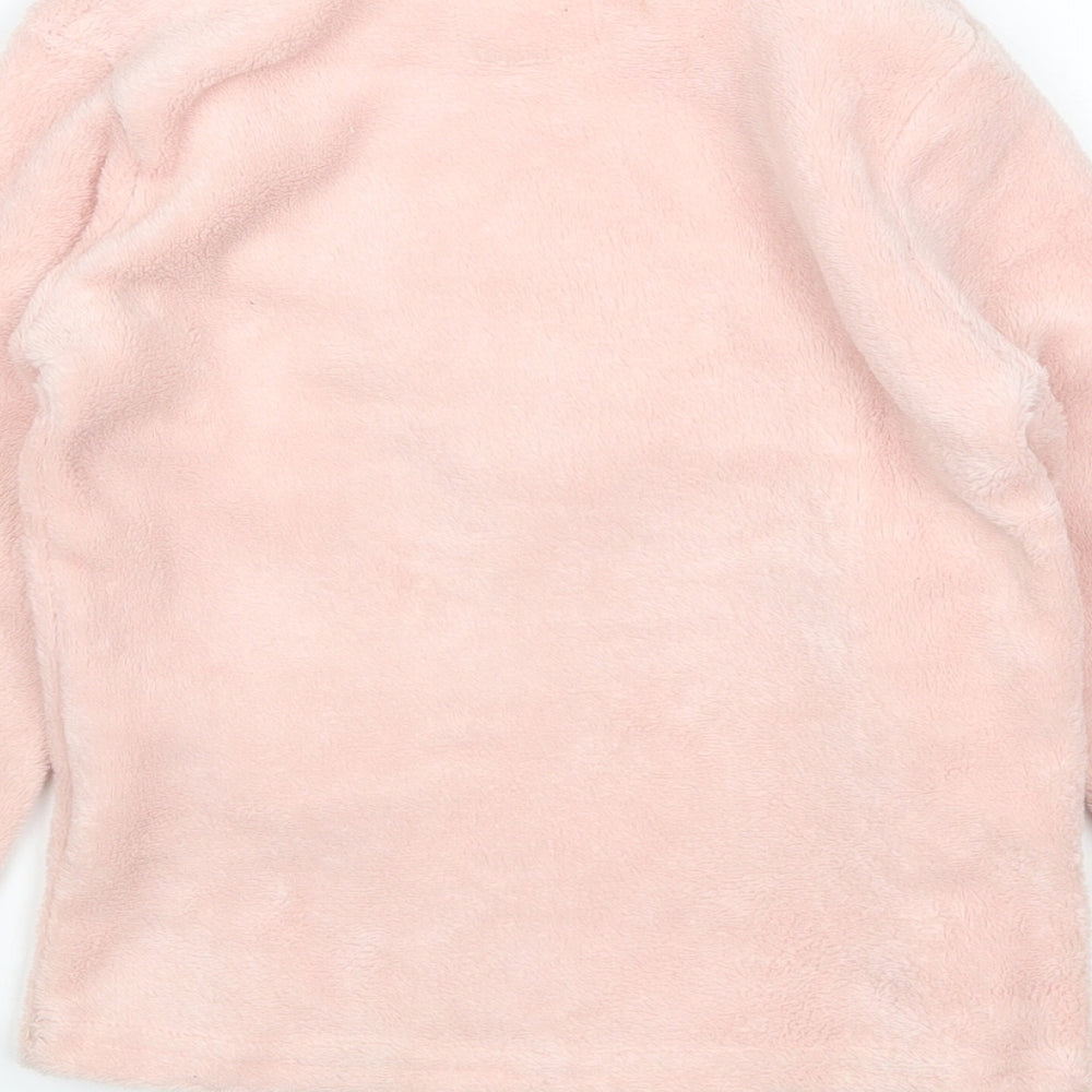 Brand and care label for Primark girls’ pink top pyjama top, size 6-7, years
