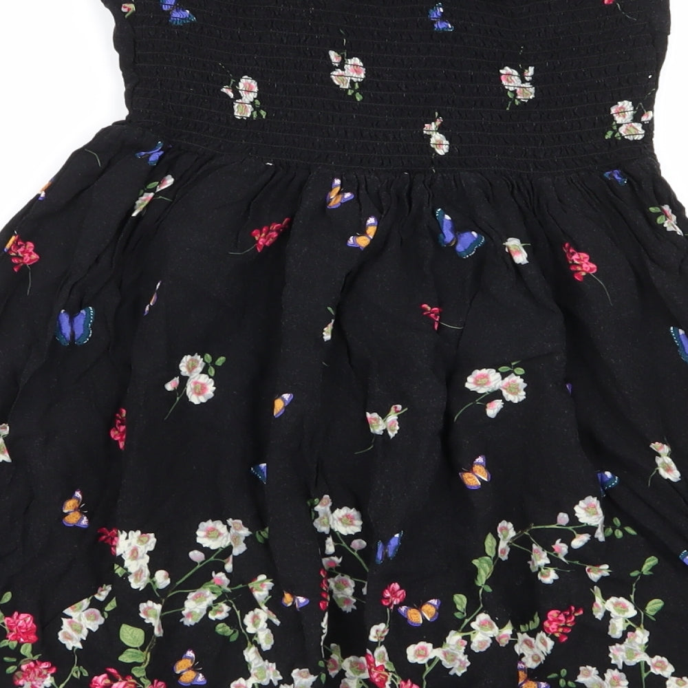 Brand and care label for Primark women’s black floral fit & flare, size UK 8