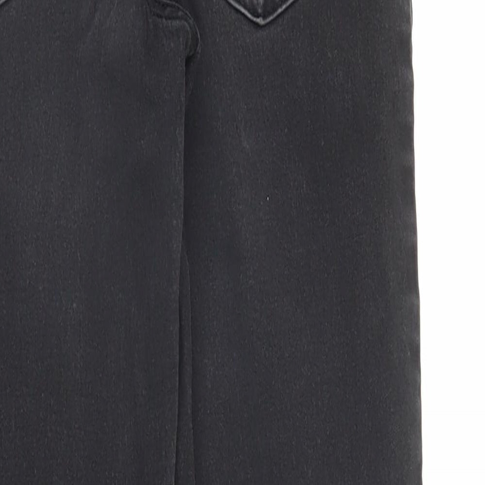 Brand and care label for Marks & Spencer women’s black denim skinny jeans, size UK 8, 26-inch leg