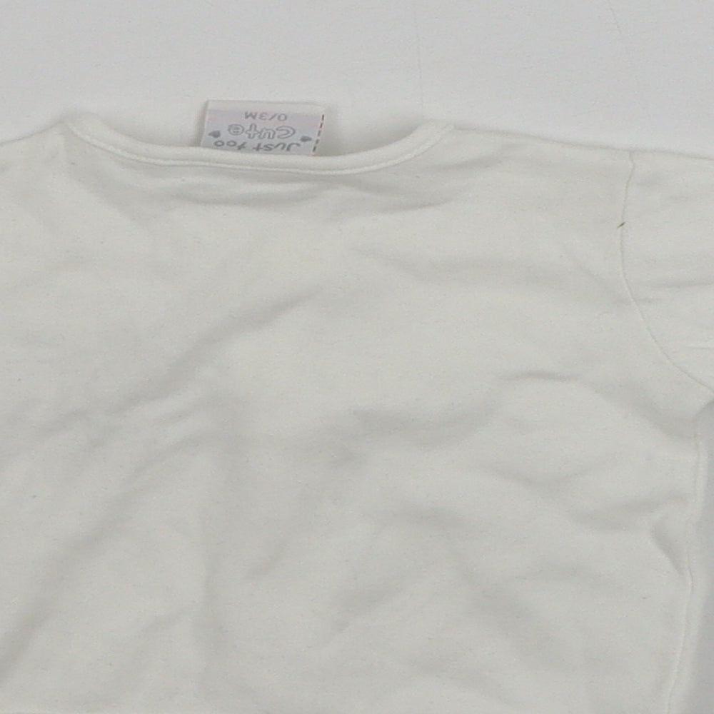 Brand and care label for JUST TOO CUTE Baby White Jacket