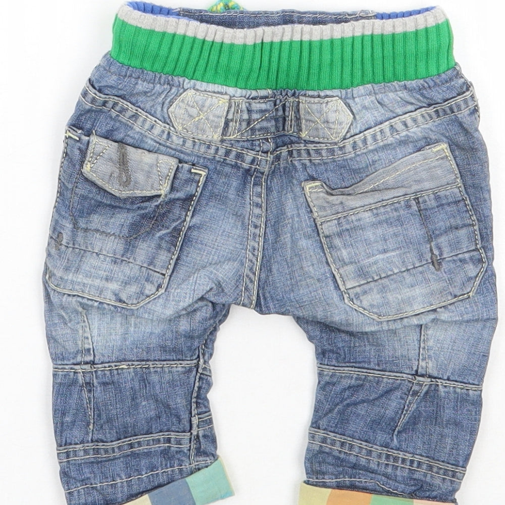 Brand and care label for Next boys’ blue cargo jeans, size 3-6, months
