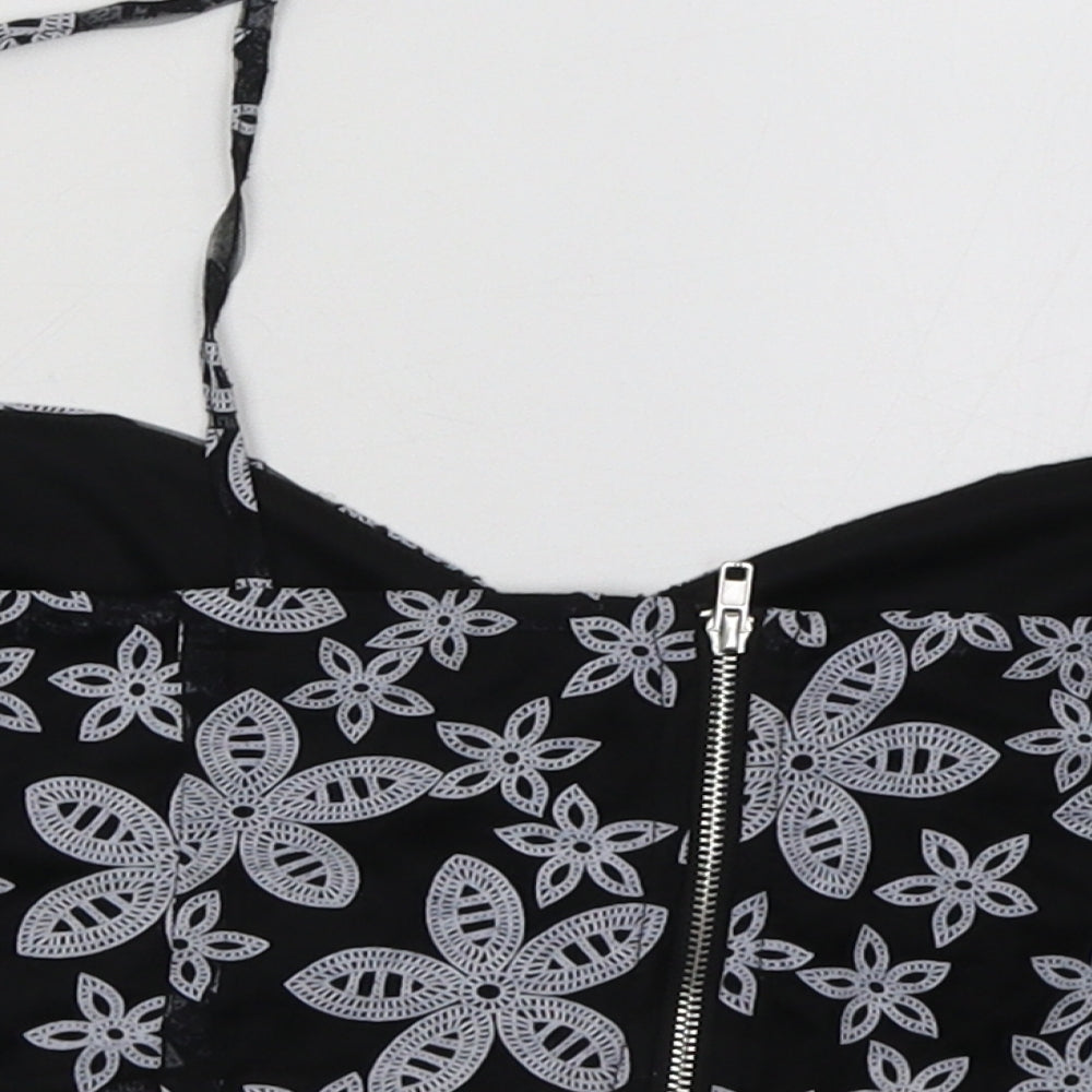 Brand and care label for Boohoo women’s black cropped tank, size UK 12