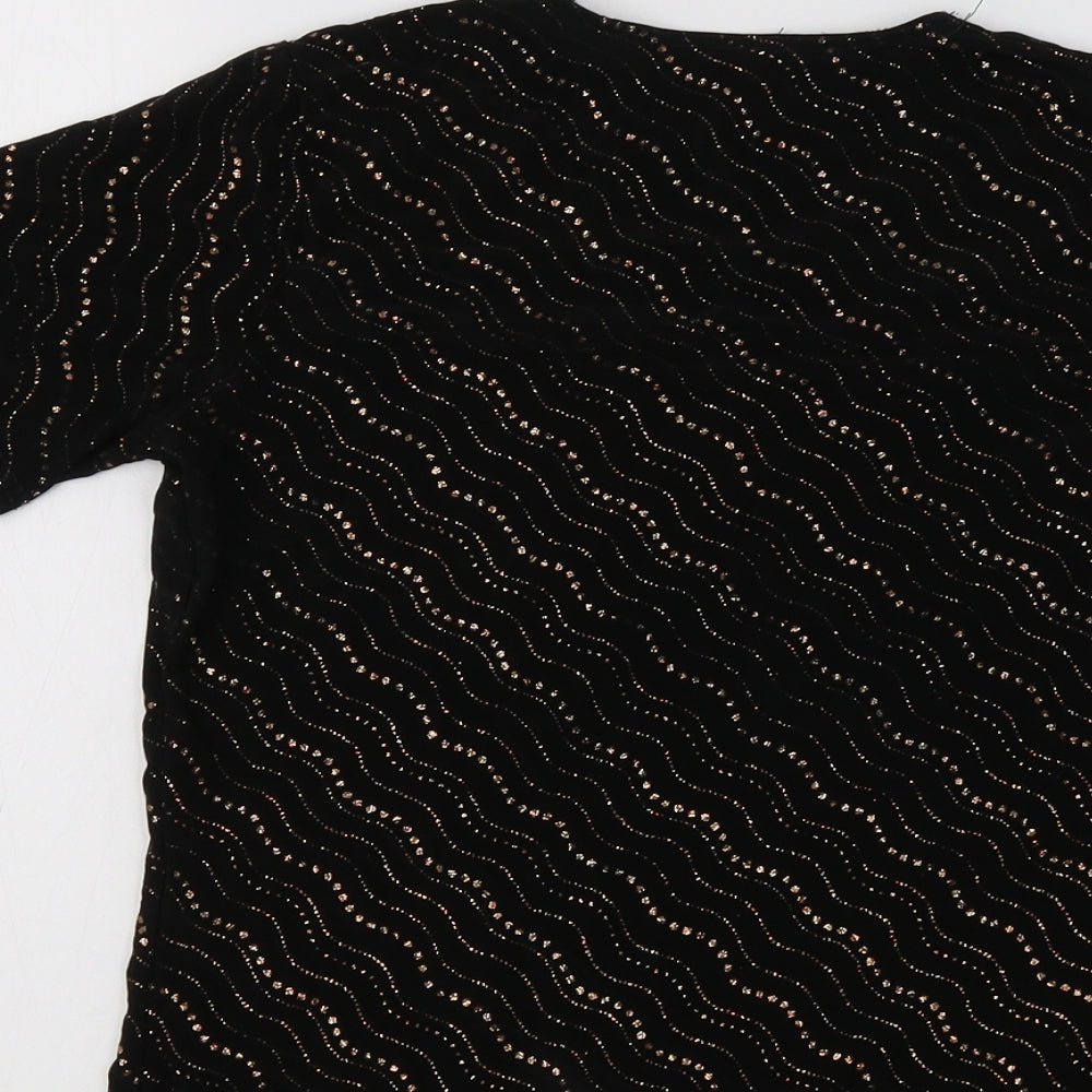 Brand and care label for CMD women’s black geometric basic blouse, size M