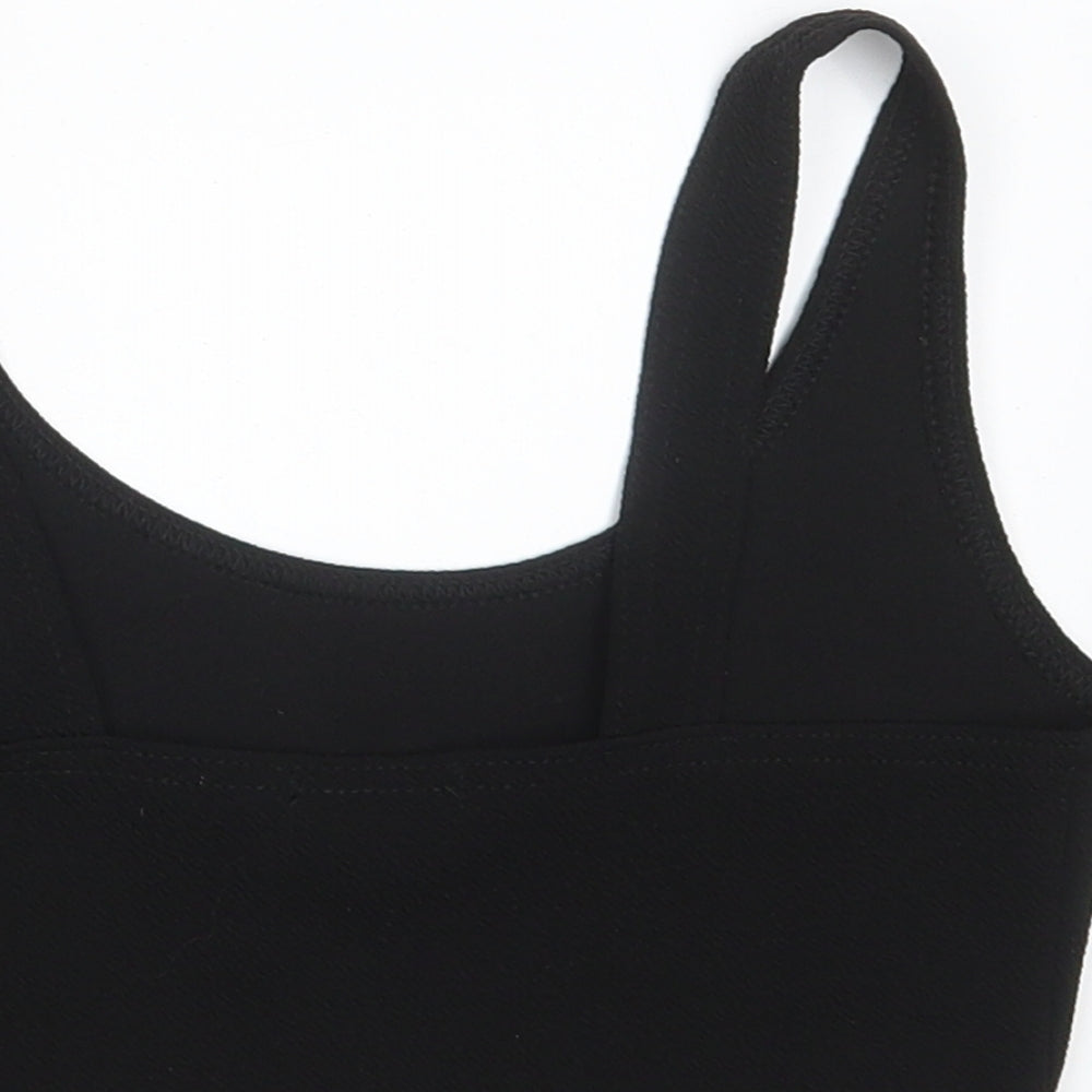 Brand and care label for Boohoo women’s black cropped tank, size UK 10