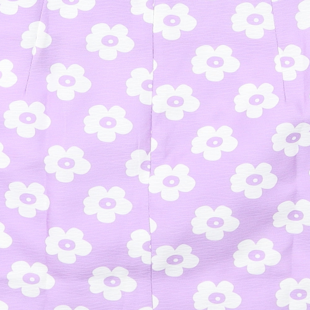 Brand and care label for SHEIN women’s purple floral a-line skirt, size S