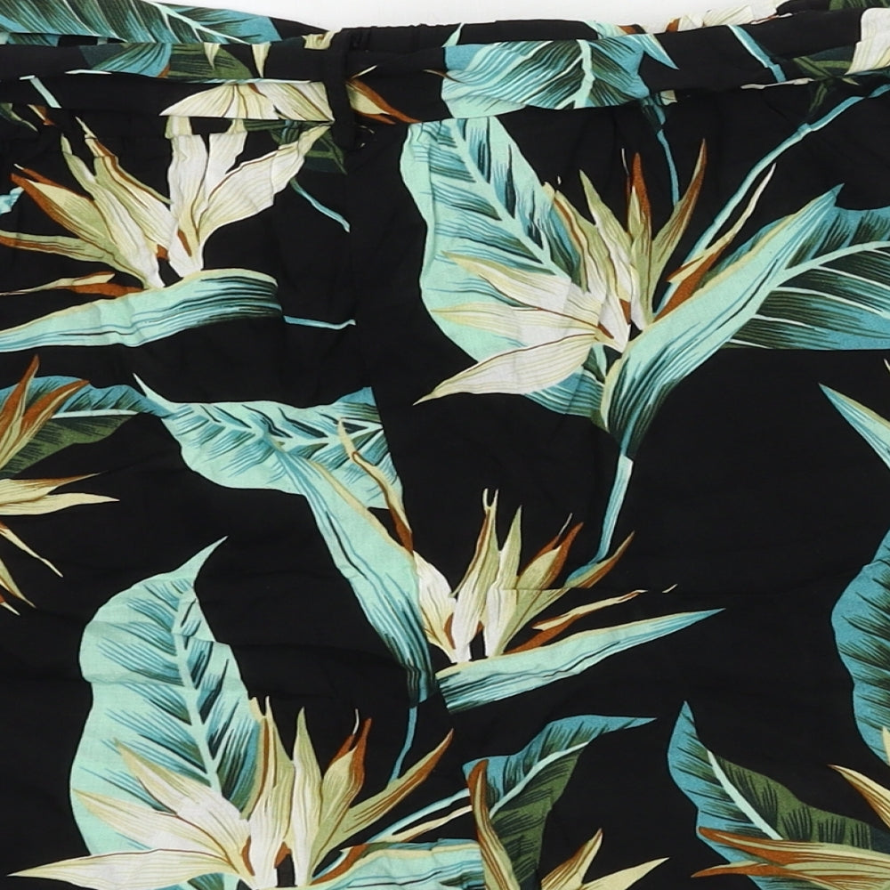 Brand and care label for SHEIN women’s black floral paperbag shorts, size L