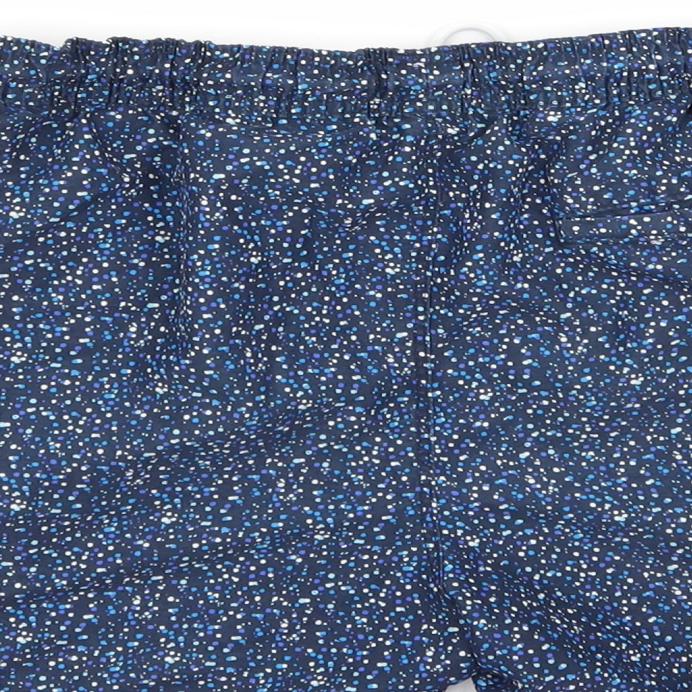 Brand and care label for Next men’s blue geometric sweat shorts, size M, - stretch waistband