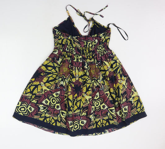 Back view of Atmosphere women’s yellow geometric a-line, size UK 10