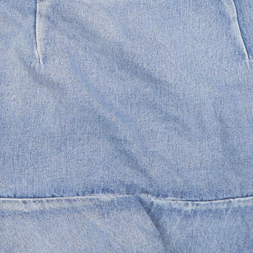 Brand and care label for Primark women’s blue denim mini skirt, size UK 8