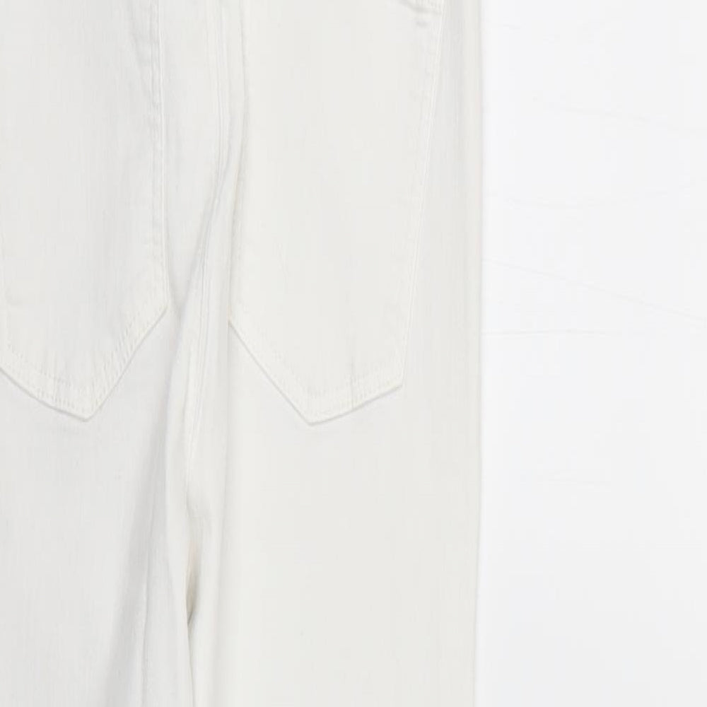 Brand and care label for Topshop women’s white skinny jeans, size UK 30, 25-inch leg