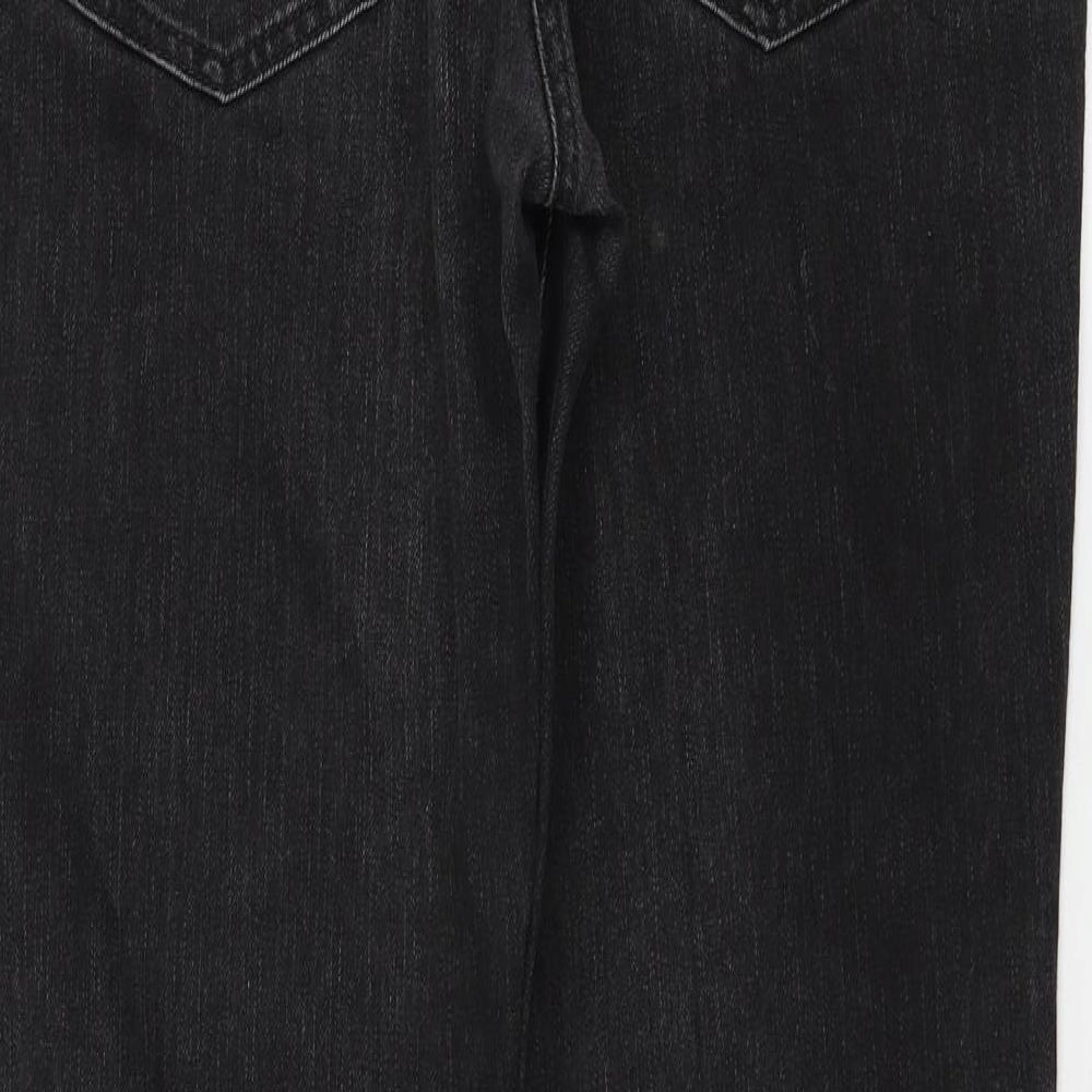 Brand and care label for River Island women’s black straight jeans, size UK 38, 30-inch leg