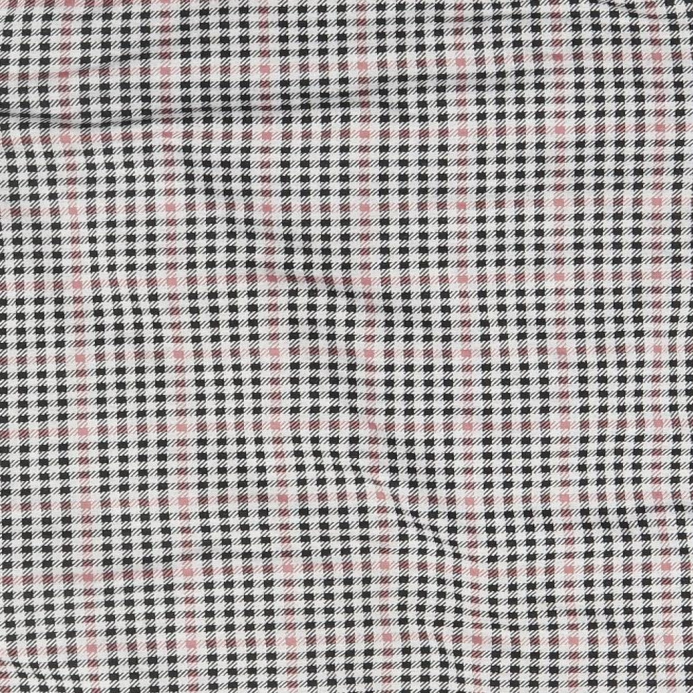Brand and care label for Divided women’s grey houndstooth jacket, size UK 4