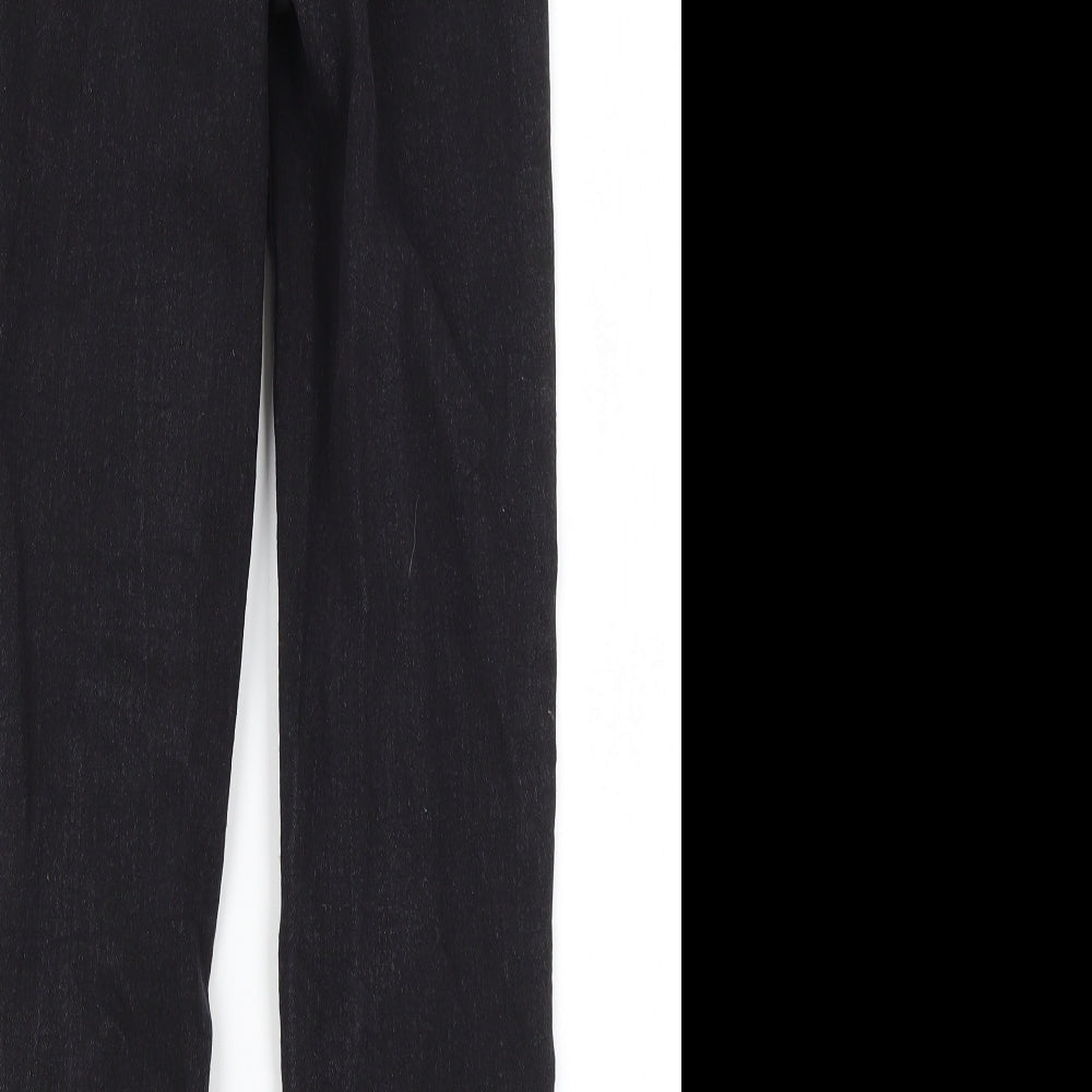 Brand and care label for PRETTYLITTLETHING women’s black skinny jeans, size UK 4, 24-inch leg