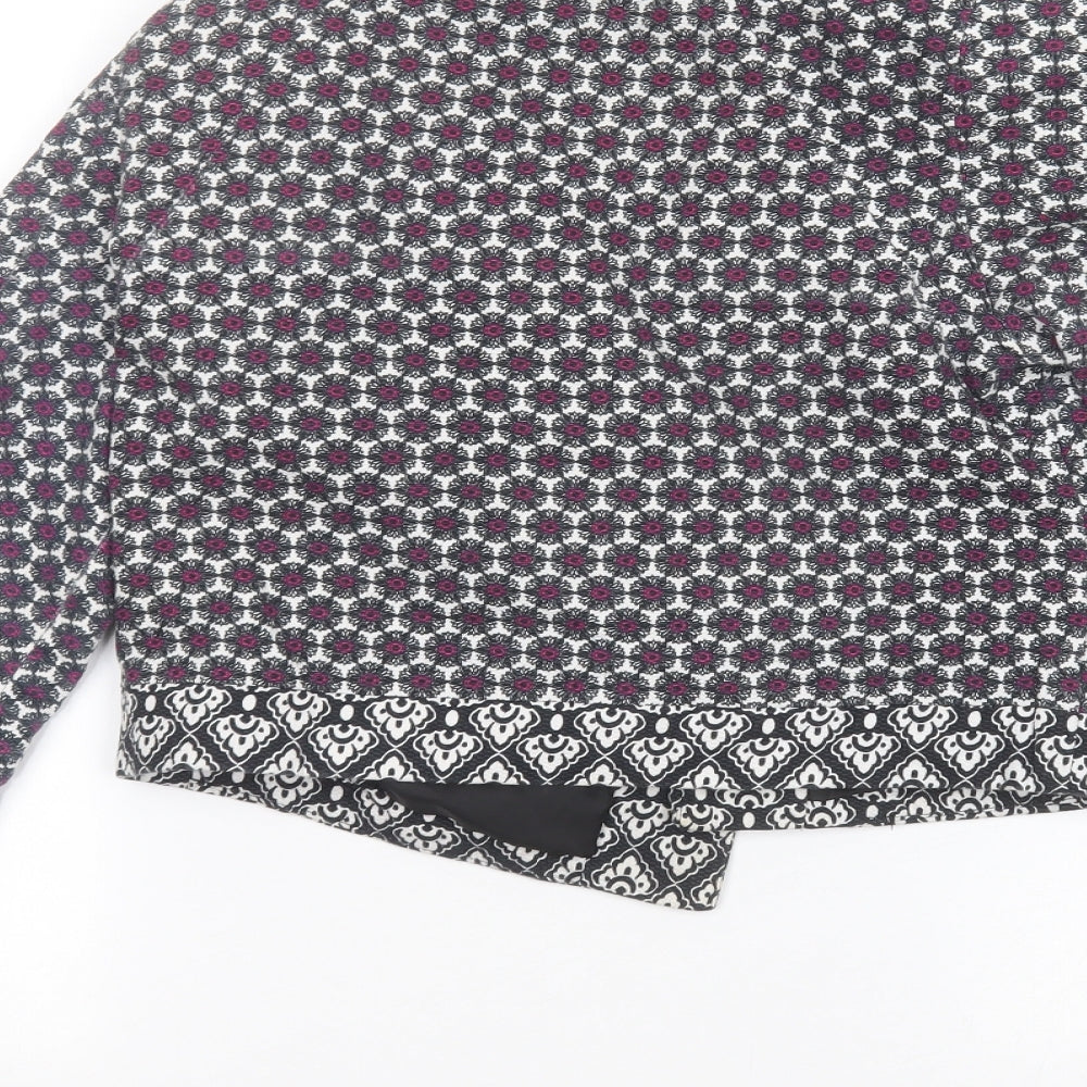 Brand and care label for Atmosphere women’s white floral jacket, size UK 10