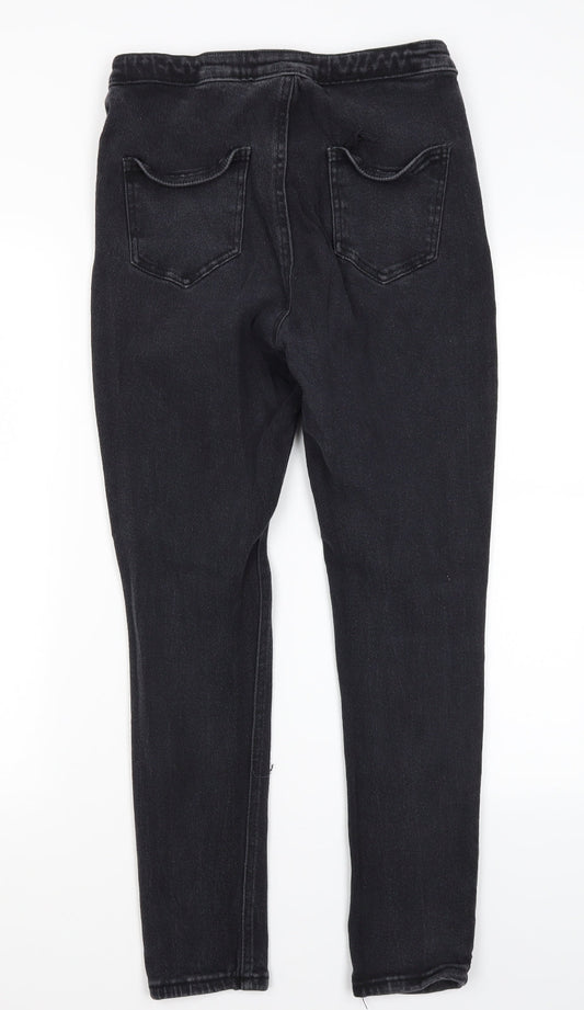 Back view of PRETTYLITTLETHING women’s black cotton skinny jeans, size UK 12, 26.5-inch leg regular