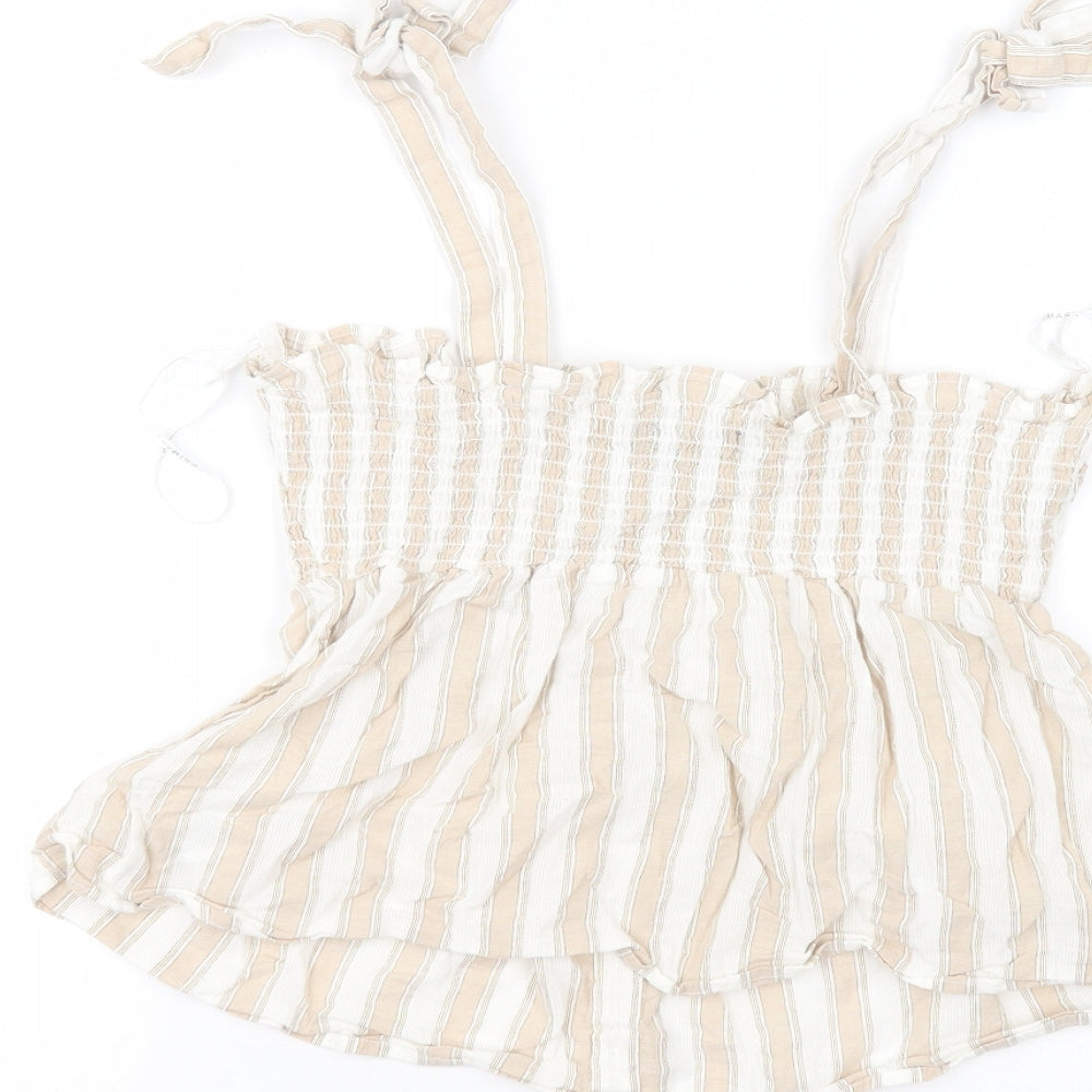 Brand and care label for Primark women’s white striped cotton basic t-shirt, size UK 10, off the shoulder