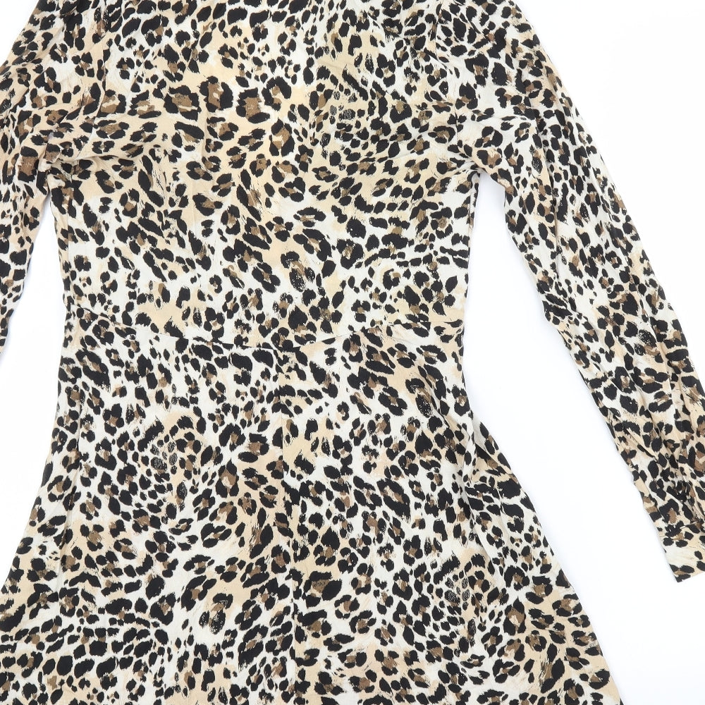 Brand and care label for Primark women’s beige animal print viscose shirt dress, size UK 8, collared