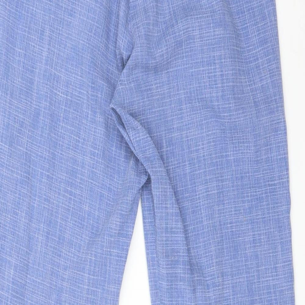Brand and care label for Cotswold women’s blue polyester trousers, size UK 10, 29-inch leg regular