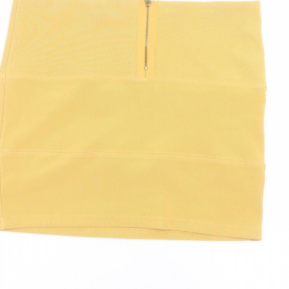 Brand and care label for Papaya women’s yellow polyester mini skirt, size UK 12