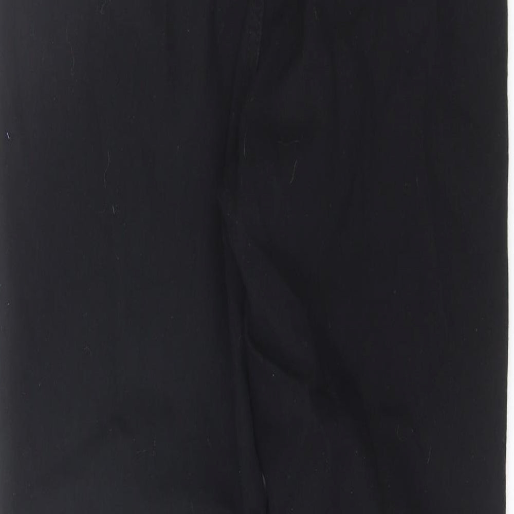 Brand and care label for PRETTYLITTLETHING women’s black cotton skinny jeans, size UK 12, 25-inch leg regular