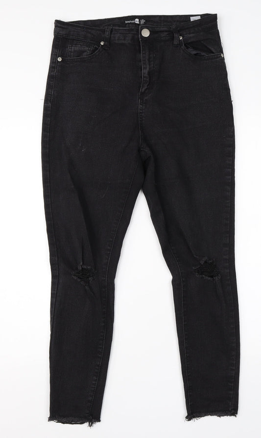 Additional front view of Boohoo women’s black cotton skinny jeans, size UK 12, 24-inch leg regular